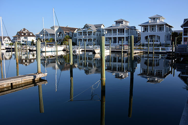 Homes line the harbor on Bald Head Island, NC