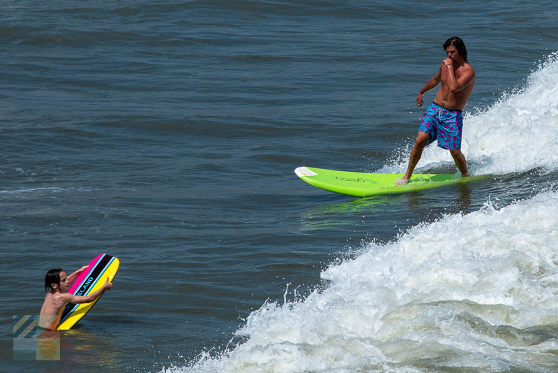 Surfers off Carolina Beach